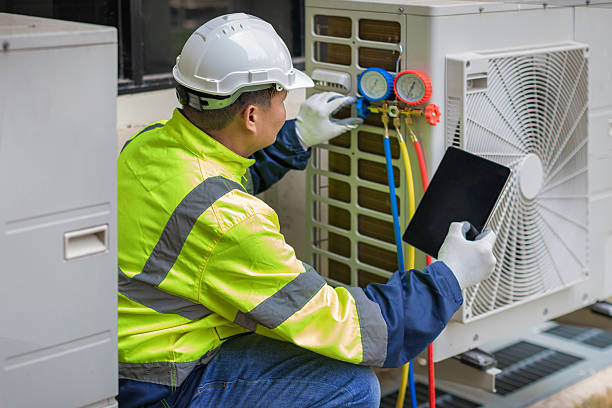 Professional Ac Installation technician working in Marshall, IL